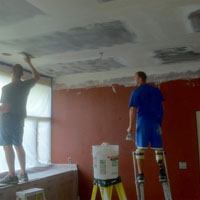 Applying the plaster ... but check out the close-up of this photo in the next pic