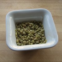 I peeled the skins off, revealing two beans per cherry in a gooey, sweet-tasting pulp