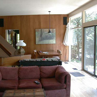 The living room looking left. Couch was in the den in Wellesley. An Elizabeth Van painting is over the dining table, which also came from Wellesley. The fireplace is to to the left of this pic (again).