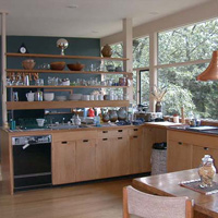 The kitchen looking left, from the doorway to the LR. We love all the glass, and have long since lost any inhibitions we might have harbored.